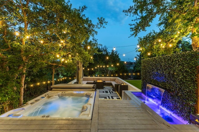 321 Cumberland Cv, Georgetown, TX 78628 - view of swimming pool with a covered hot tub, outdoor lounge area, and a deck