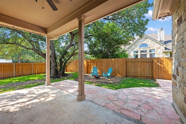 view of patio / terrace featuring a fenced backyard and ceiling fan