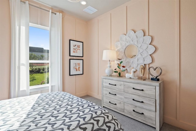 217 Northcrest Dr, Liberty Hill, TX 78642 - bedroom featuring multiple windows and carpet