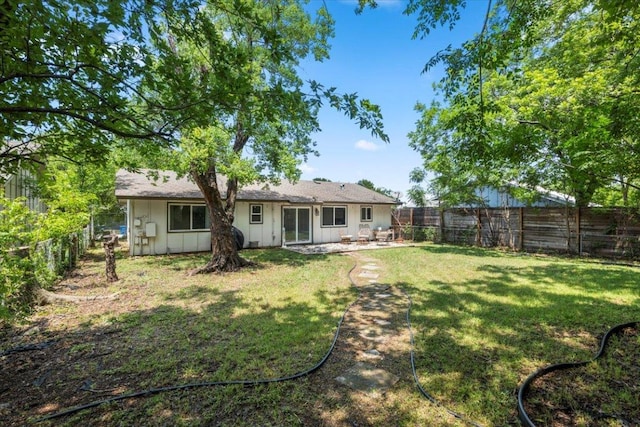 2312 Aldford Dr, Austin, TX 78745 - rear view of property featuring board and batten siding