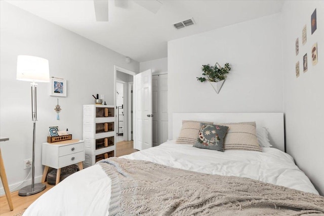 2312 Aldford Dr, Austin, TX 78745 - bedroom featuring light wood-style flooring, a ceiling fan, and a closet