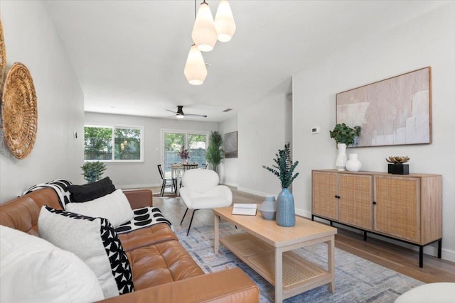 2312 Aldford Dr, Austin, TX 78745 - living area featuring a ceiling fan and wood finished floors