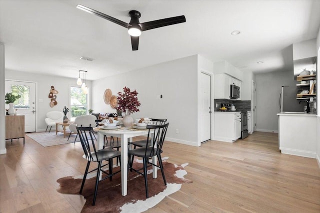 2312 Aldford Dr, Austin, TX 78745 - dining space featuring light wood-style floors and ceiling fan