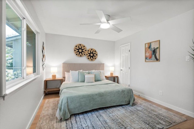 2312 Aldford Dr, Austin, TX 78745 - bedroom featuring wood finished floors and a ceiling fan