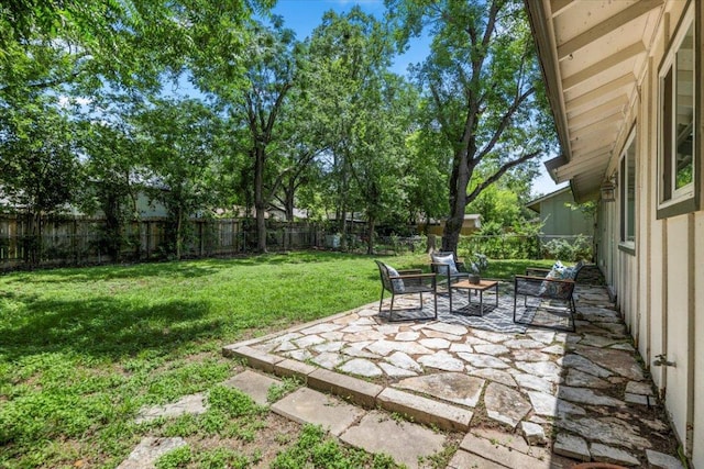 2312 Aldford Dr, Austin, TX 78745 - fenced backyard featuring a patio