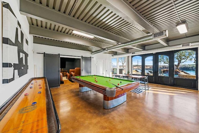 3500 River Oaks Dr, Kingsland, TX 78639 - playroom with concrete floors, beamed ceiling, a barn door, french doors, and billiards