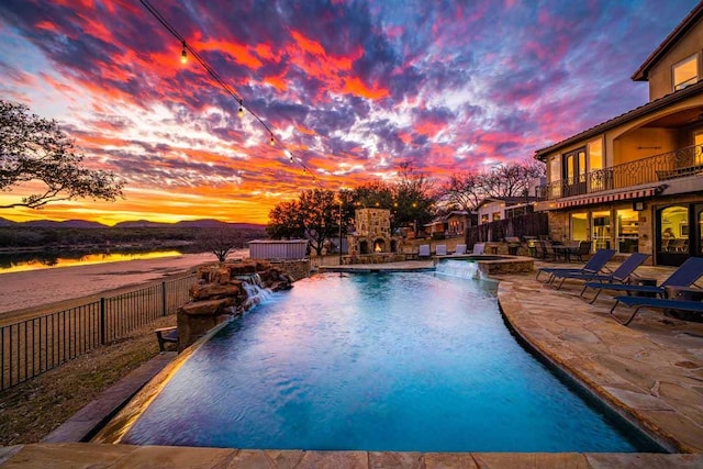 3500 River Oaks Dr, Kingsland, TX 78639 - view of pool featuring a pool with connected hot tub, a patio area, and a fenced backyard