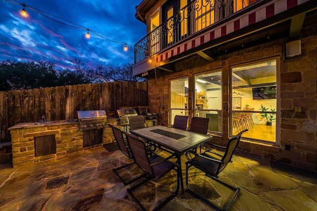 3500 River Oaks Dr, Kingsland, TX 78639 - patio / terrace with exterior kitchen, a patio area, and outdoor dining space