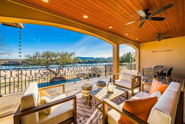 3500 River Oaks Dr, Kingsland, TX 78639 - view of patio with outdoor lounge area, a water view, ceiling fan, and outdoor dining space