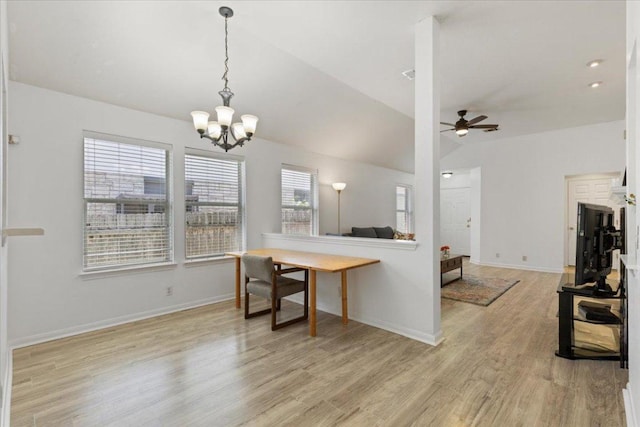 21223 Byerly Turk Dr, Pflugerville, TX 78660 - kitchen featuring light wood-style flooring, ceiling fan, a chandelier, vaulted ceiling, and hanging light fixtures