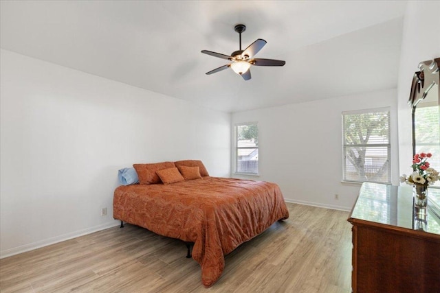 21223 Byerly Turk Dr, Pflugerville, TX 78660 - bedroom featuring light wood-style flooring, baseboards, a ceiling fan, and vaulted ceiling