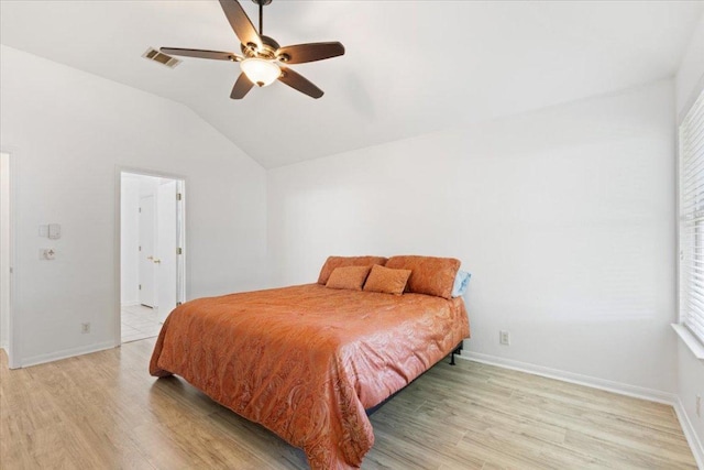 21223 Byerly Turk Dr, Pflugerville, TX 78660 - bedroom featuring light wood finished floors, vaulted ceiling, baseboards, and ceiling fan