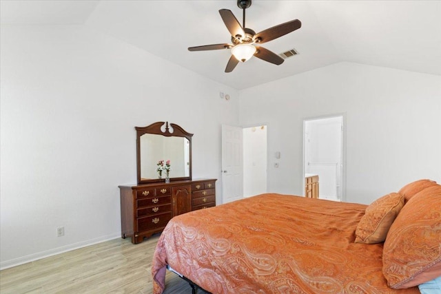 21223 Byerly Turk Dr, Pflugerville, TX 78660 - bedroom with vaulted ceiling, light wood-type flooring, baseboards, ceiling fan, and connected bathroom