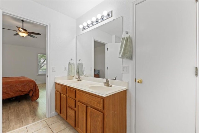 21223 Byerly Turk Dr, Pflugerville, TX 78660 - full bath featuring ensuite bathroom, double vanity, ceiling fan, and tile patterned floors