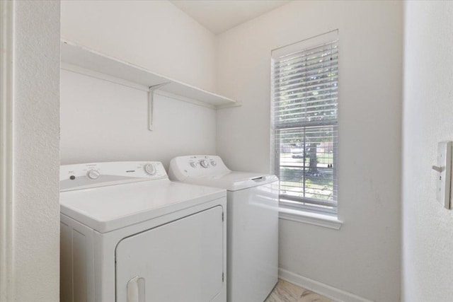 21223 Byerly Turk Dr, Pflugerville, TX 78660 - washroom featuring independent washer and dryer and baseboards