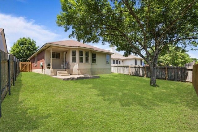 21223 Byerly Turk Dr, Pflugerville, TX 78660 - back of house with a patio area