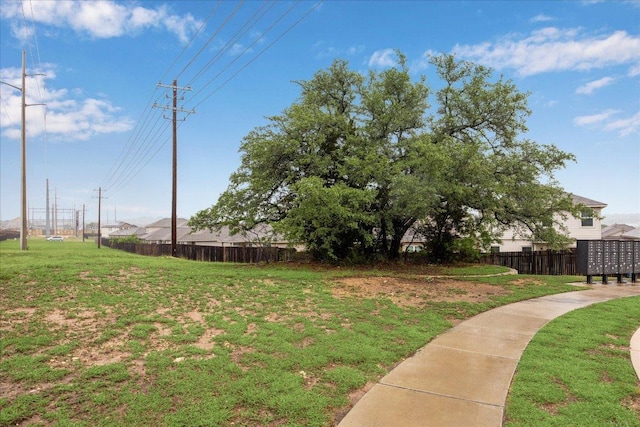 view of yard with mail area