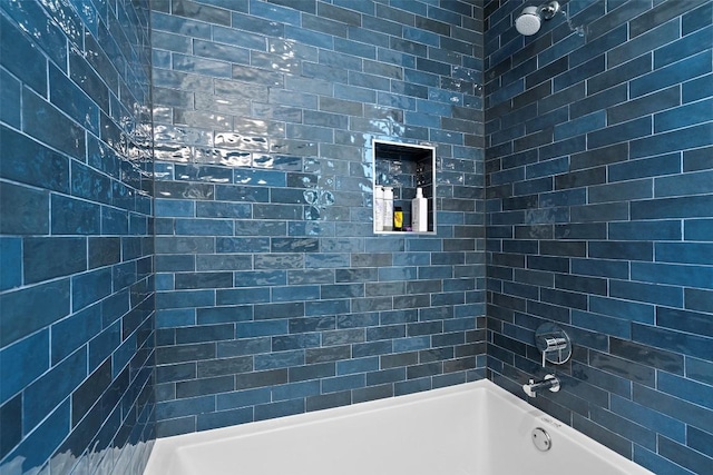 full bath featuring washtub / shower combination