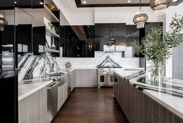 912 Watercliffe, Lago Vista, TX 78645 - kitchen with modern cabinets, open shelves, appliances with stainless steel finishes, dark wood-type flooring, and tasteful backsplash