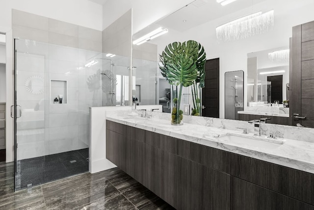 912 Watercliffe, Lago Vista, TX 78645 - bathroom with a stall shower, double vanity, and marble finish floors
