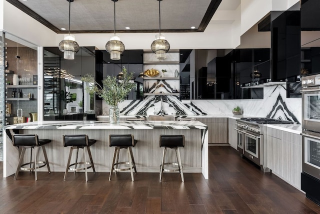 912 Watercliffe, Lago Vista, TX 78645 - kitchen featuring modern cabinets, appliances with stainless steel finishes, decorative backsplash, light countertops, and recessed lighting