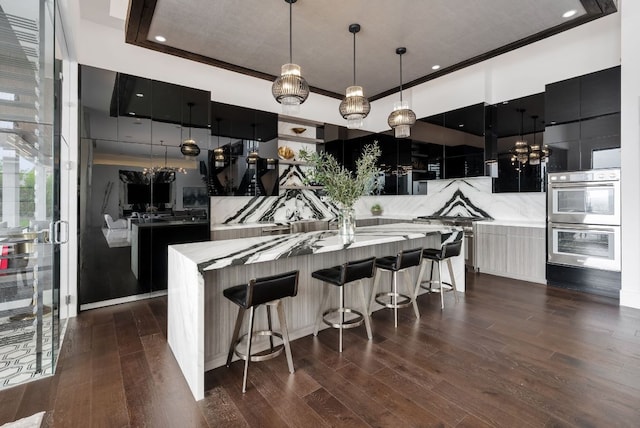 912 Watercliffe, Lago Vista, TX 78645 - kitchen with modern cabinets, stainless steel double oven, light countertops, decorative backsplash, and recessed lighting