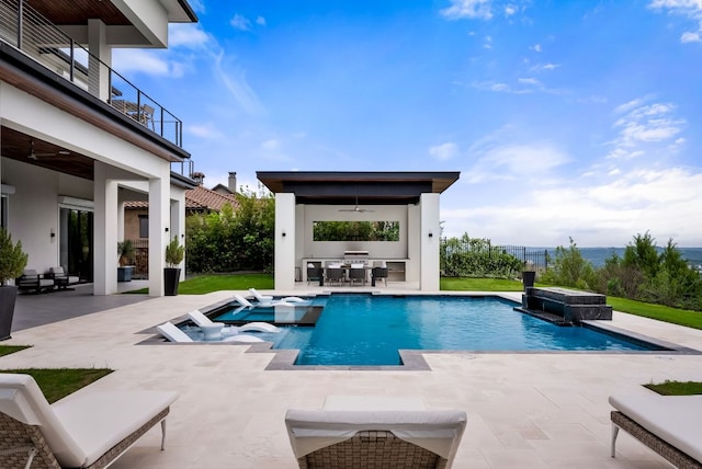 912 Watercliffe, Lago Vista, TX 78645 - view of pool with a ceiling fan, a pool with connected hot tub, a patio area, and outdoor dining area