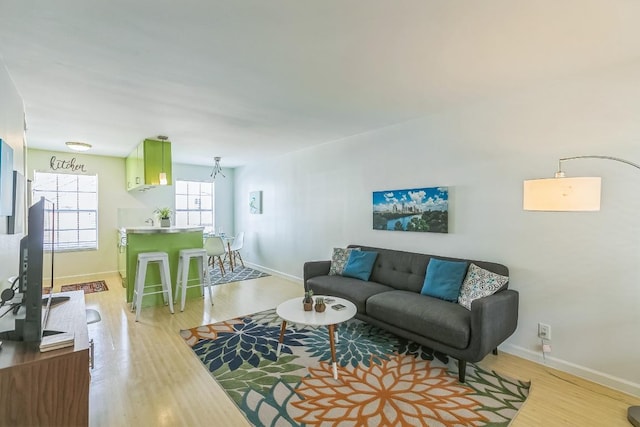 300 Crockett St Unit 210, Austin, TX 78704 - living area featuring light wood finished floors and baseboards