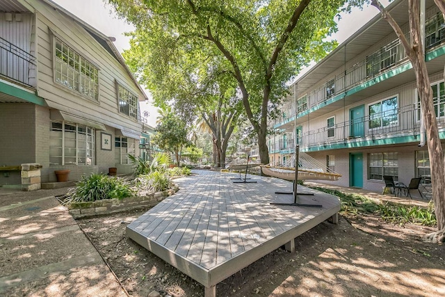 300 Crockett St Unit 210, Austin, TX 78704 - view of property's community with a deck
