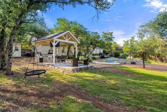 8909 Gallant Fox Rd, Austin, TX 78737 - view of green lawn with a gazebo, a patio, and an outdoor pool