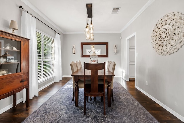 8909 Gallant Fox Rd, Austin, TX 78737 - dining room with a chandelier, dark wood-style flooring, ornamental molding, and baseboards