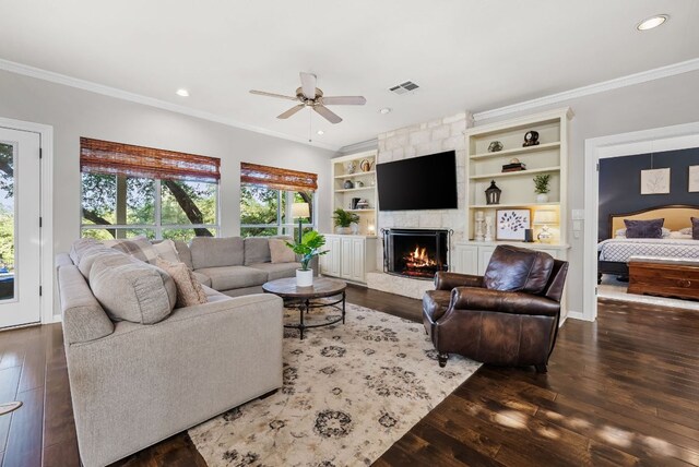 8909 Gallant Fox Rd, Austin, TX 78737 - living area with crown molding, ceiling fan, hardwood / wood-style floors, a fireplace, and recessed lighting