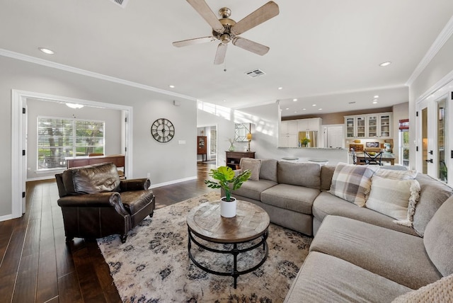 8909 Gallant Fox Rd, Austin, TX 78737 - living room featuring dark wood-type flooring, baseboards, recessed lighting, ceiling fan, and ornamental molding