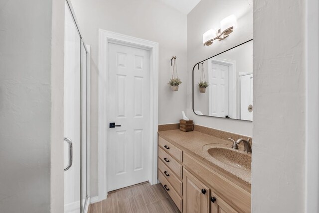 8909 Gallant Fox Rd, Austin, TX 78737 - bathroom featuring a stall shower and vanity