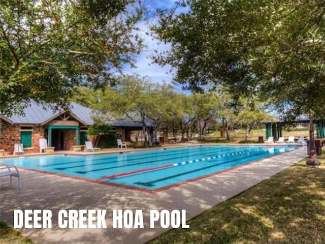 community pool featuring a patio