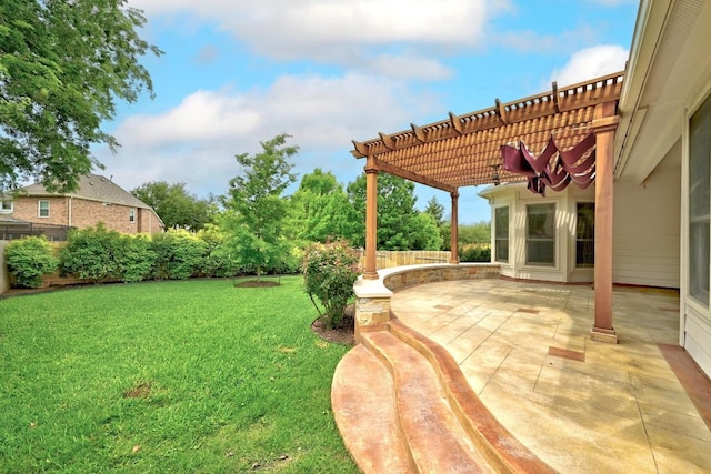 view of yard with a pergola and a patio