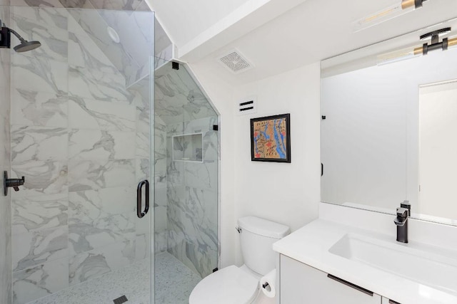 2305 E 17th St Unit B, Austin, TX 78702 - bathroom featuring vanity, toilet, and a marble finish shower
