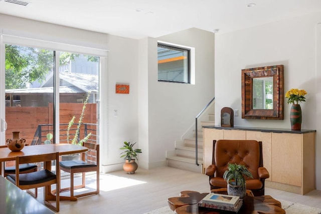 2305 E 17th St Unit B, Austin, TX 78702 - living room featuring stairs and light wood-style flooring