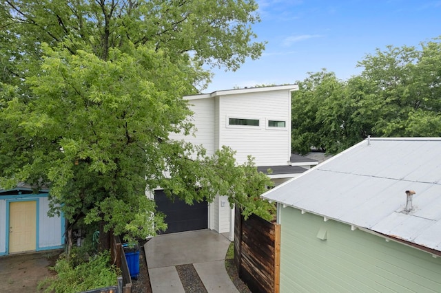 1204 W 51st St Unit 2, Austin, TX 78756 - view of side of property with a storage unit and an outdoor structure