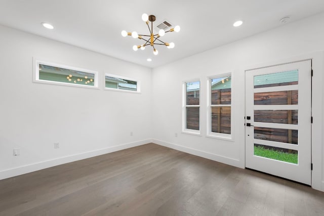 1204 W 51st St Unit 2, Austin, TX 78756 - empty room with a chandelier, wood finished floors, baseboards, and recessed lighting