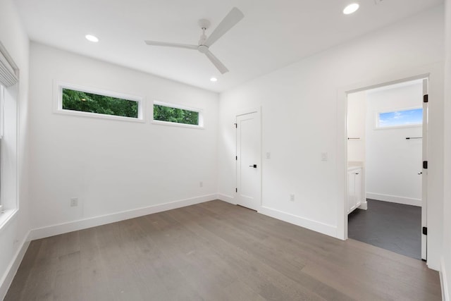 1204 W 51st St Unit 2, Austin, TX 78756 - unfurnished bedroom with wood finished floors, recessed lighting, baseboards, and ceiling fan