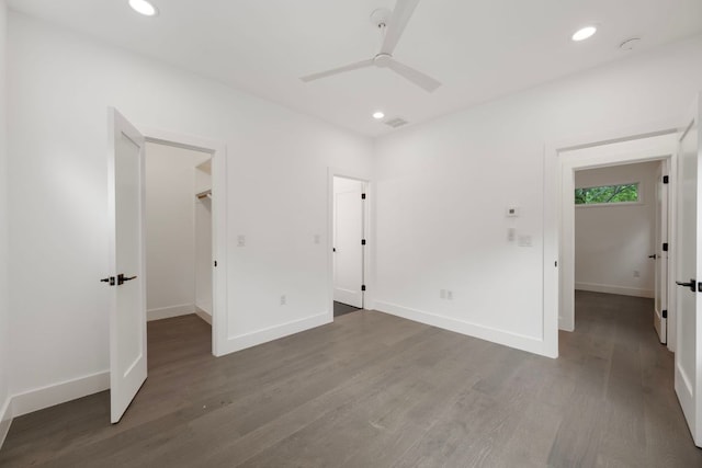 1204 W 51st St Unit 2, Austin, TX 78756 - unfurnished bedroom with a spacious closet, wood finished floors, recessed lighting, baseboards, and ceiling fan