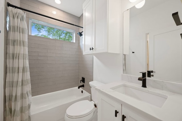 1204 W 51st St Unit 2, Austin, TX 78756 - bathroom featuring shower / bath combination with curtain, toilet, and vanity