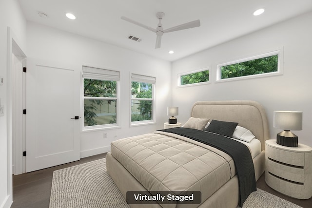 1204 W 51st St Unit 2, Austin, TX 78756 - bedroom with wood finished floors, recessed lighting, ceiling fan, and baseboards