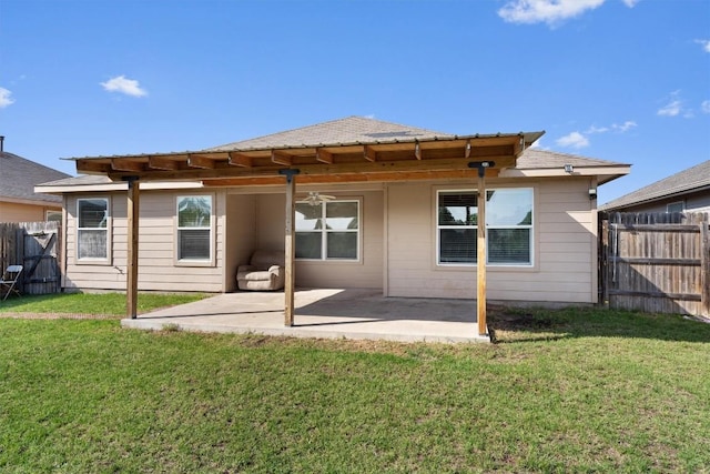 back of property featuring a patio area and a pergola