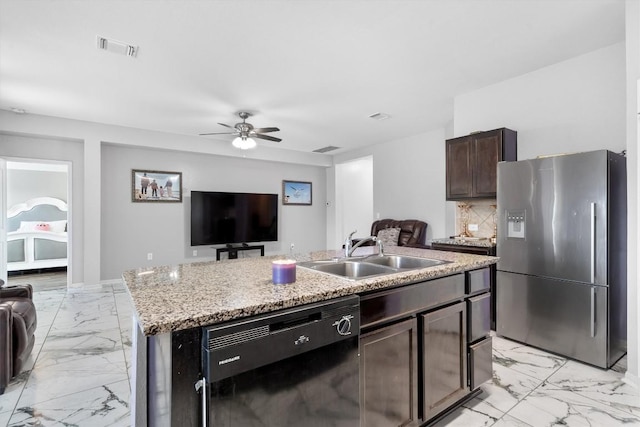 15013 Roody Ln, Austin, TX 78725 - kitchen with stainless steel refrigerator with ice dispenser, black dishwasher, a sink, light marble finish floors, and open floor plan
