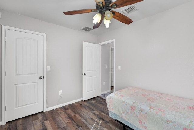 15013 Roody Ln, Austin, TX 78725 - bedroom with wood finished floors, baseboards, and ceiling fan