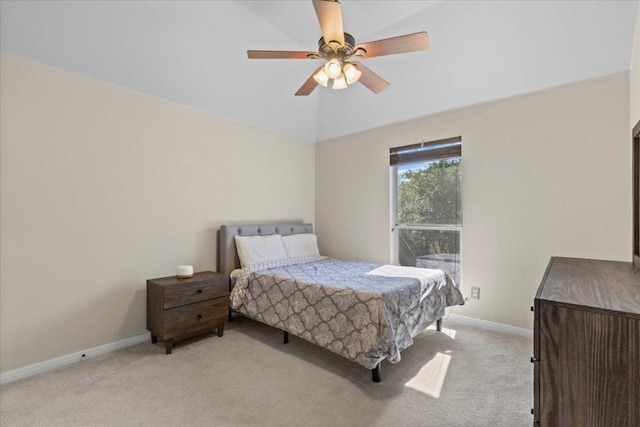 12013 Tarraza Ct, Austin, TX 78732 - carpeted bedroom with baseboards, vaulted ceiling, and a ceiling fan
