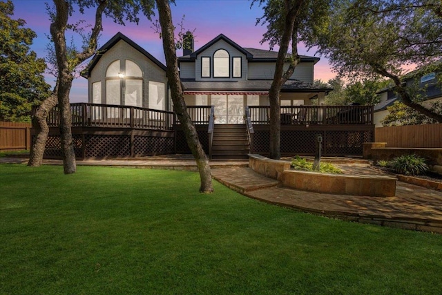 12013 Tarraza Ct, Austin, TX 78732 - back of house at dusk featuring a deck and stairs