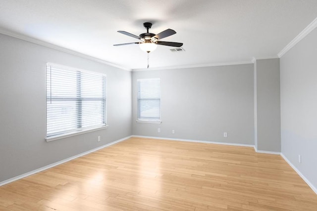 601 Abundance Ln, Kyle, TX 78640 - unfurnished room featuring ornamental molding, ceiling fan, light wood-style floors, and baseboards